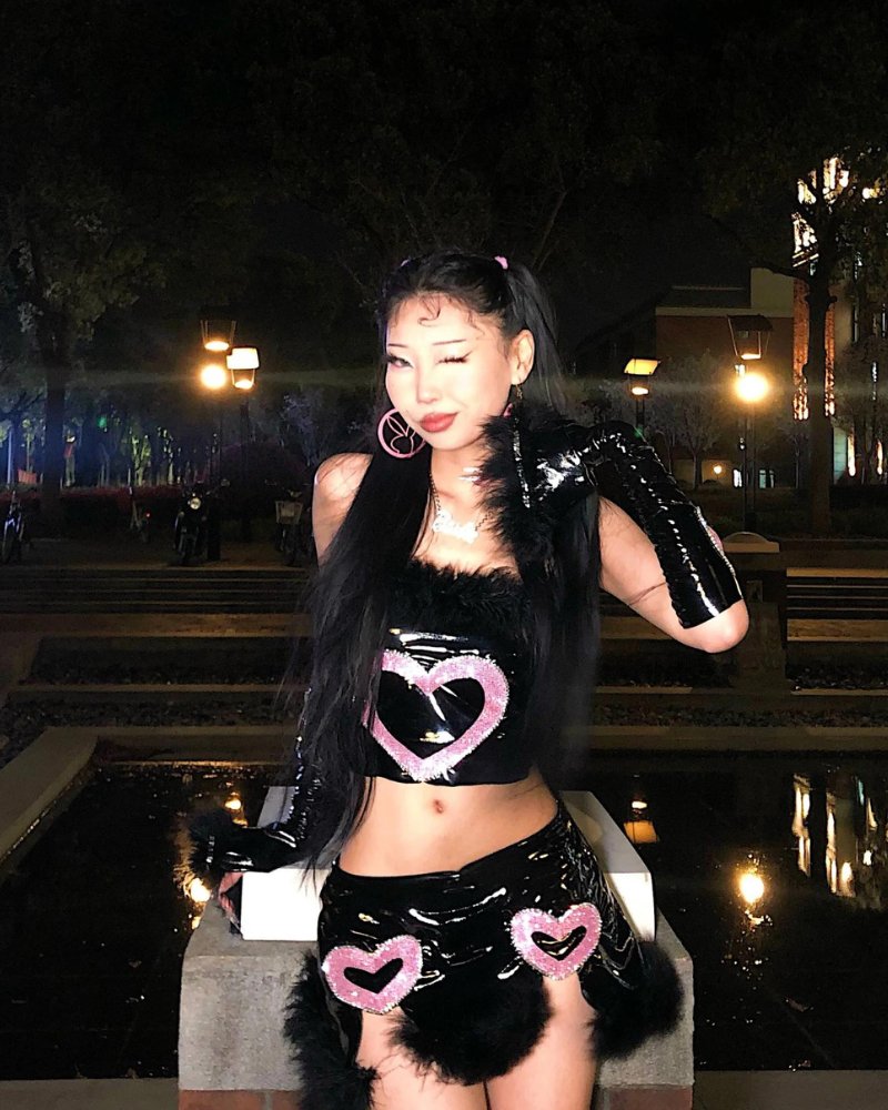 Villains' Romance black and pink heart trim plush tube top leather suit